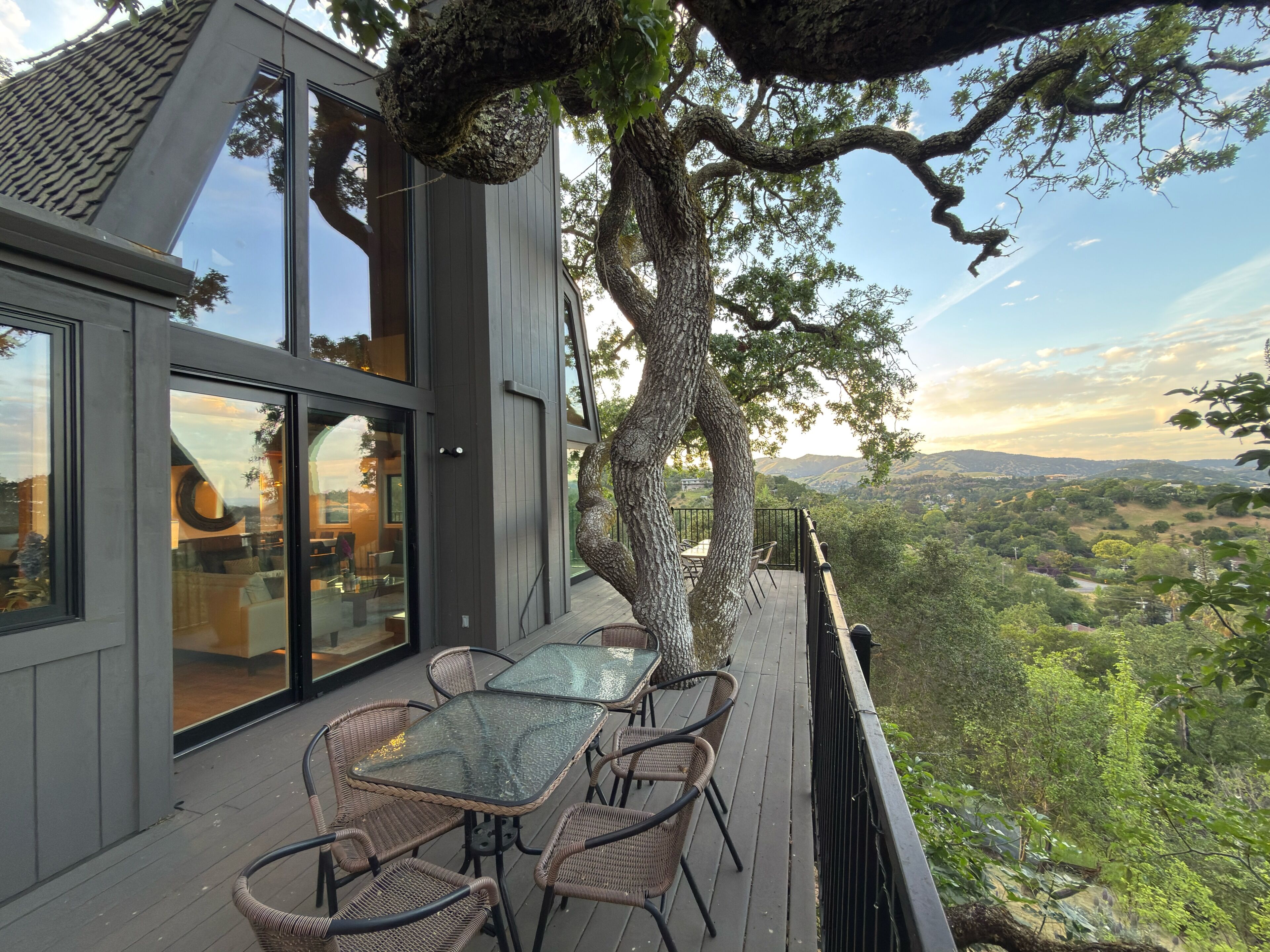 Marin Vista Retreat at twilight with a lit view deck over the Lucas Valley mountains