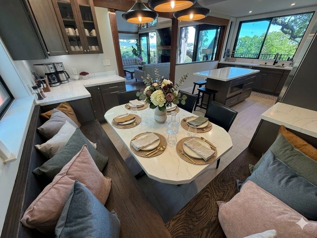 Kitchen with center island and breakfast booth seating