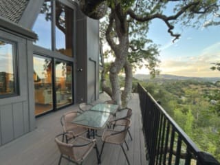 View deck at Marin Vista Retreat overlooking oak trees and Marin County ridgelines